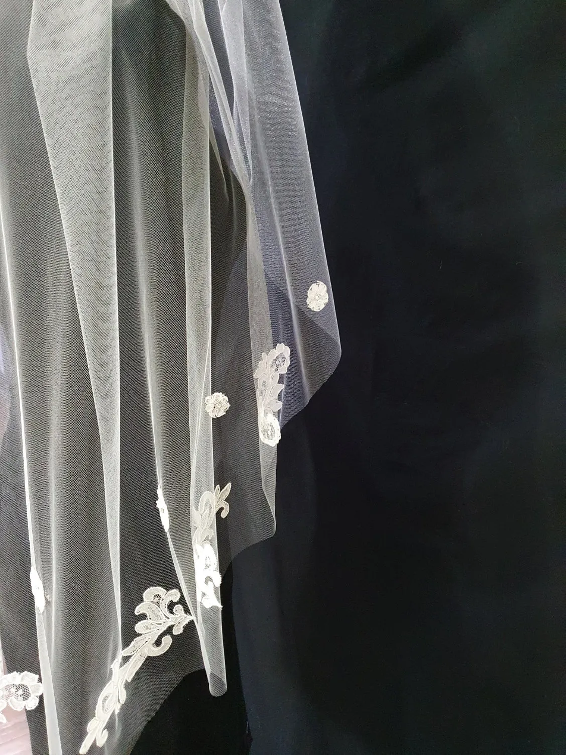 Veil 200: Fingertip light ivory veils with custom applique